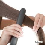 women using hair straightener for too long